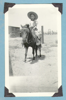 Rex Bell Jr. or George Bell on a Shetland pony: photograph