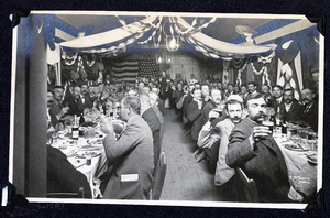 Photograph of men toasting at banquet, Tonopah (Nev.), early 1900s