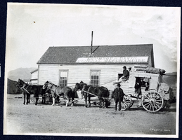 Photograph of stage in front of Lathrop & Davis General Merchandise, Tonopah (Nev.), early 1900s