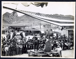 Photograph of a double handed drilling contest,Tonopah (Nev.), early 1900s
