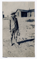 Photograph of C. A. Earle Rinker with metal lunch pail or canteen, Goldfield (Nev.), 1908