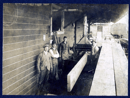 Photograph of men standing with mining machinery, Goldfield (Nev.), early 1900s
