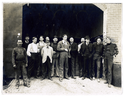 Photograph of men at building entrance, Goldfield (Nev.), early 1900s