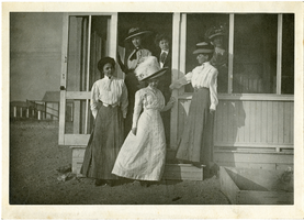 Photograph of women posing on cottage steps, Goldfield (Nev.), early 1900s