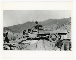 Photograph of A. N. Bradshaw driving a Model T truck near Ione, Ione (Nev.), 1900-1925