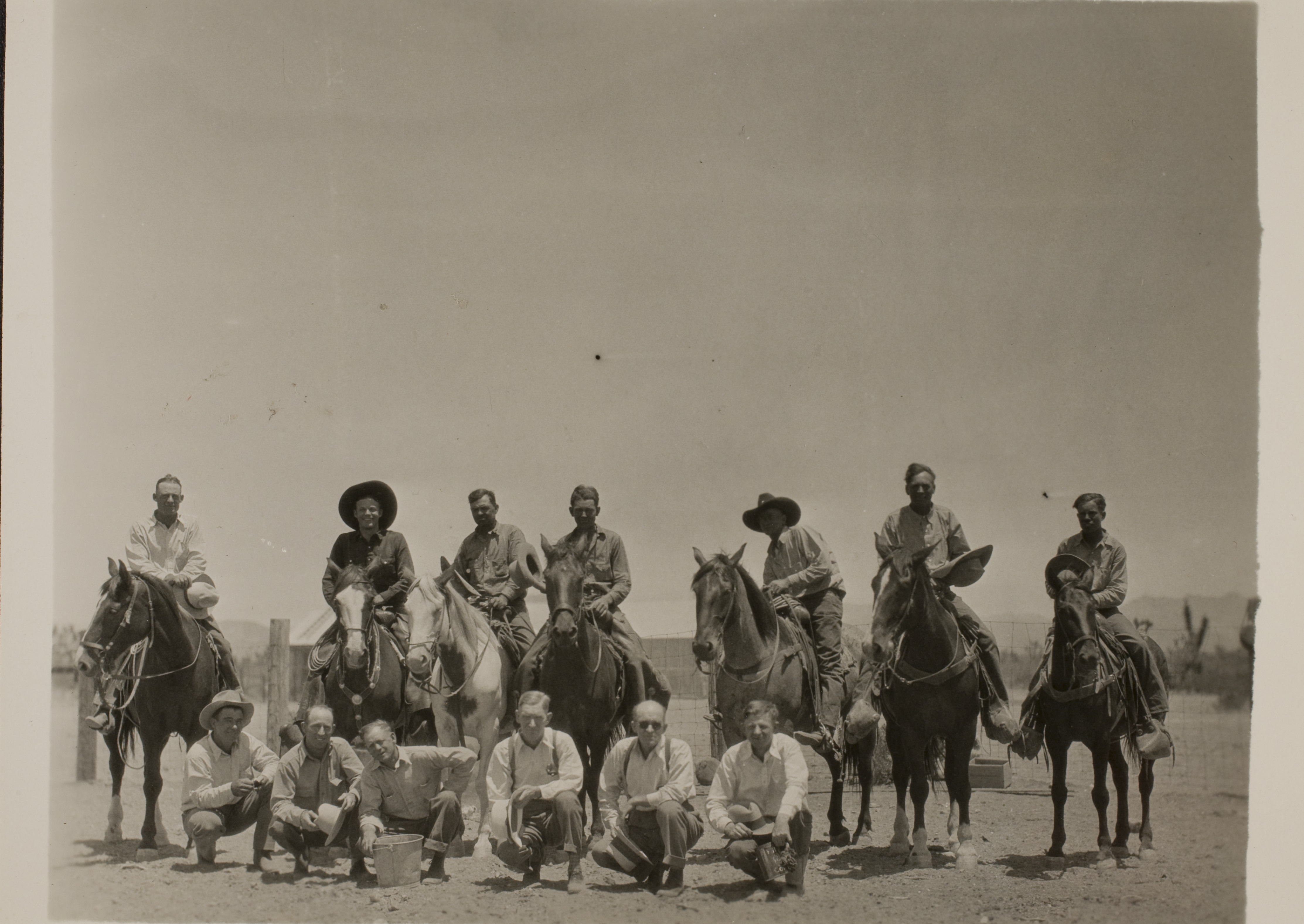 Rex Bell (George Francis Beldam) (second from left on horseback) with various cowboys at Walking Box Ranch, Nevada: photographic print