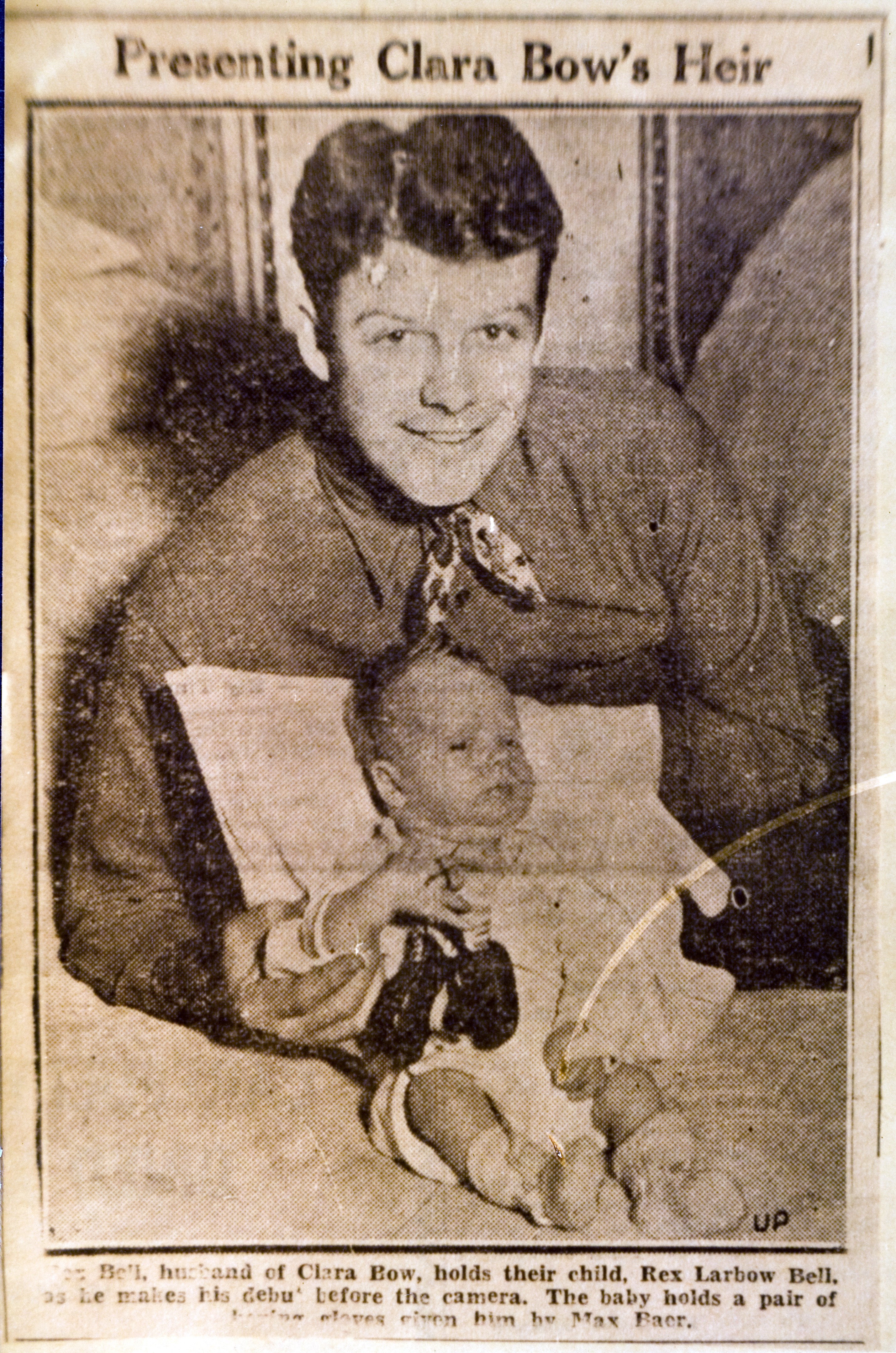 Newspaper clipping of Rex Anthony Bell, Jr (Toni Larbow Beldam)'s birth.  Photo with both Rex Jr. and Rex Sr: newspaper clipping