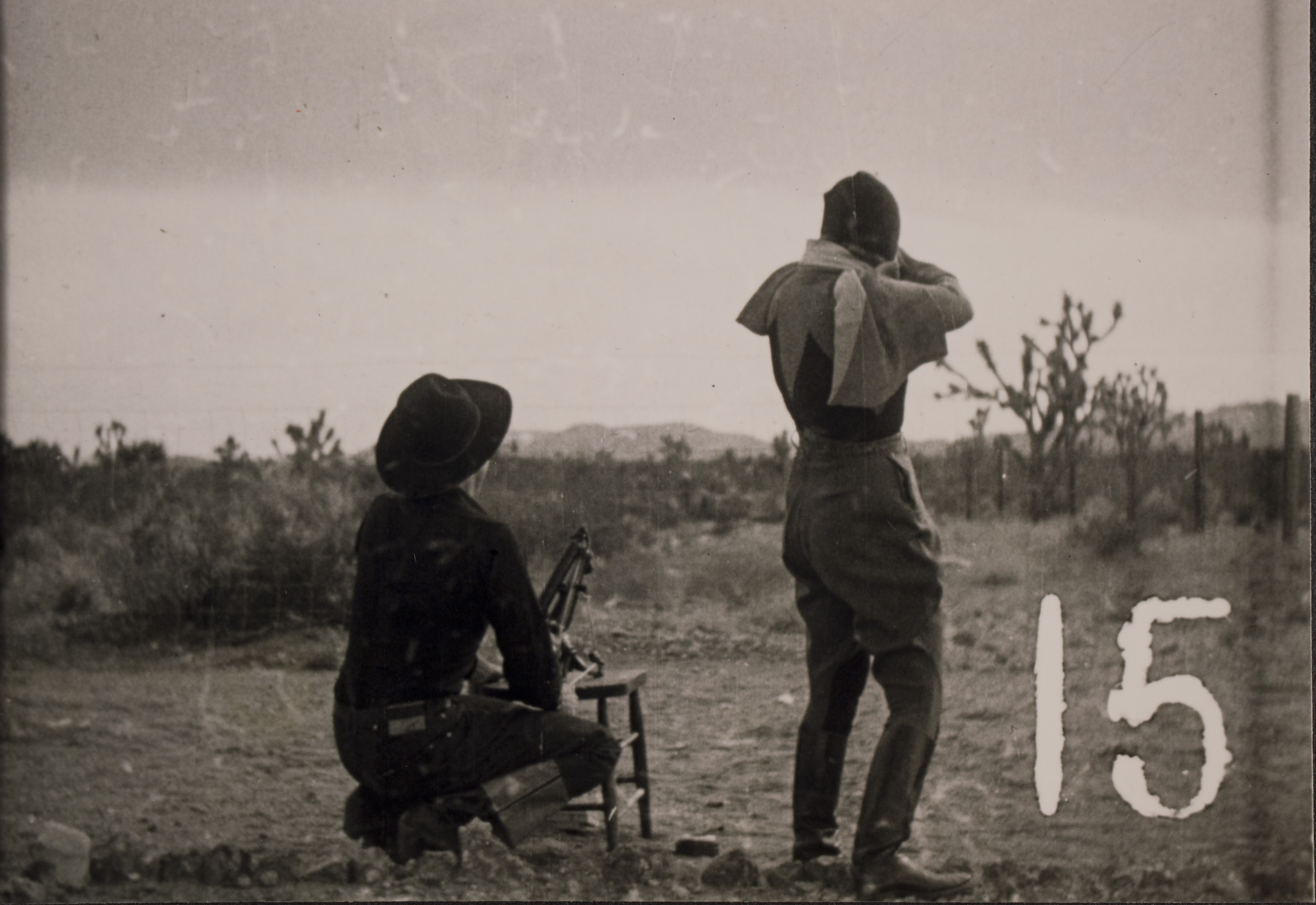 Rex Bell (George Francis Beldam) and Clara Bow at Walking Box Ranch, Nevada with skeet shooting.