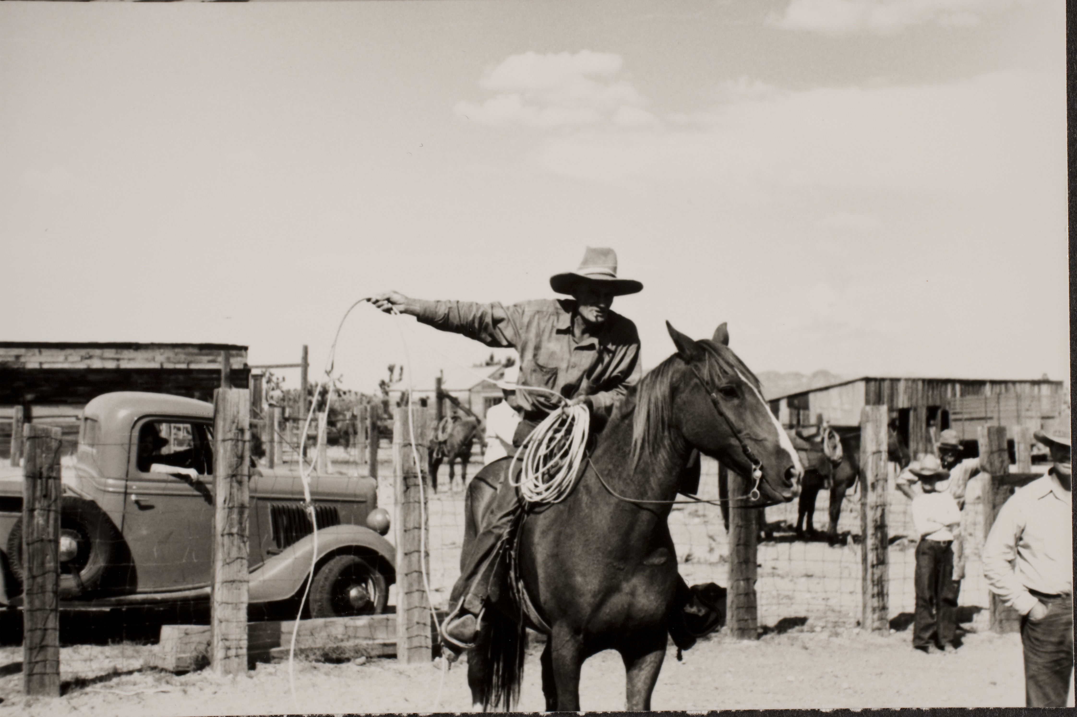 Unidentified people and cowboys on horseback at Walking Box Ranch: photographic print