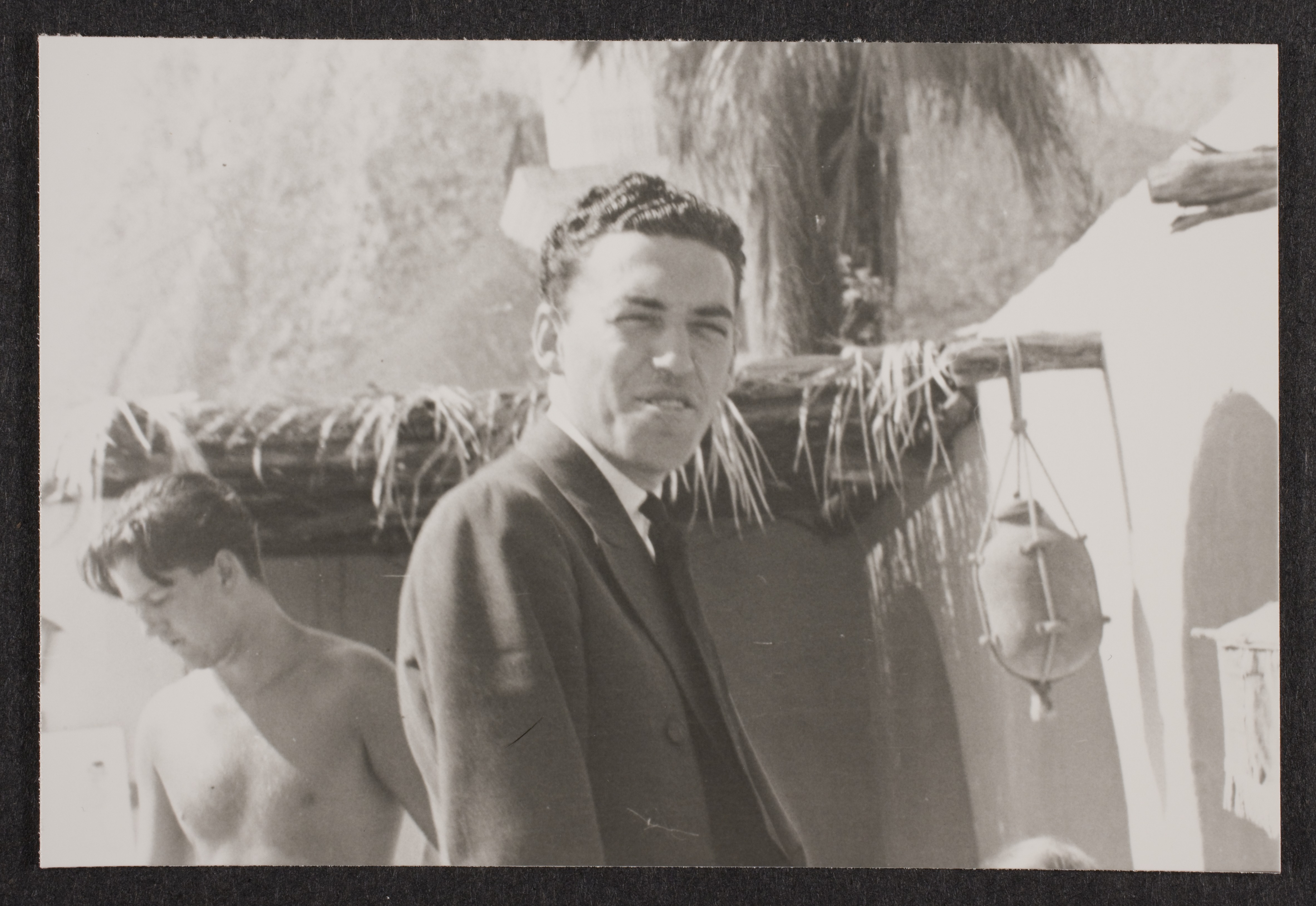 Two unidentified men outside at an unknown location: photographic print