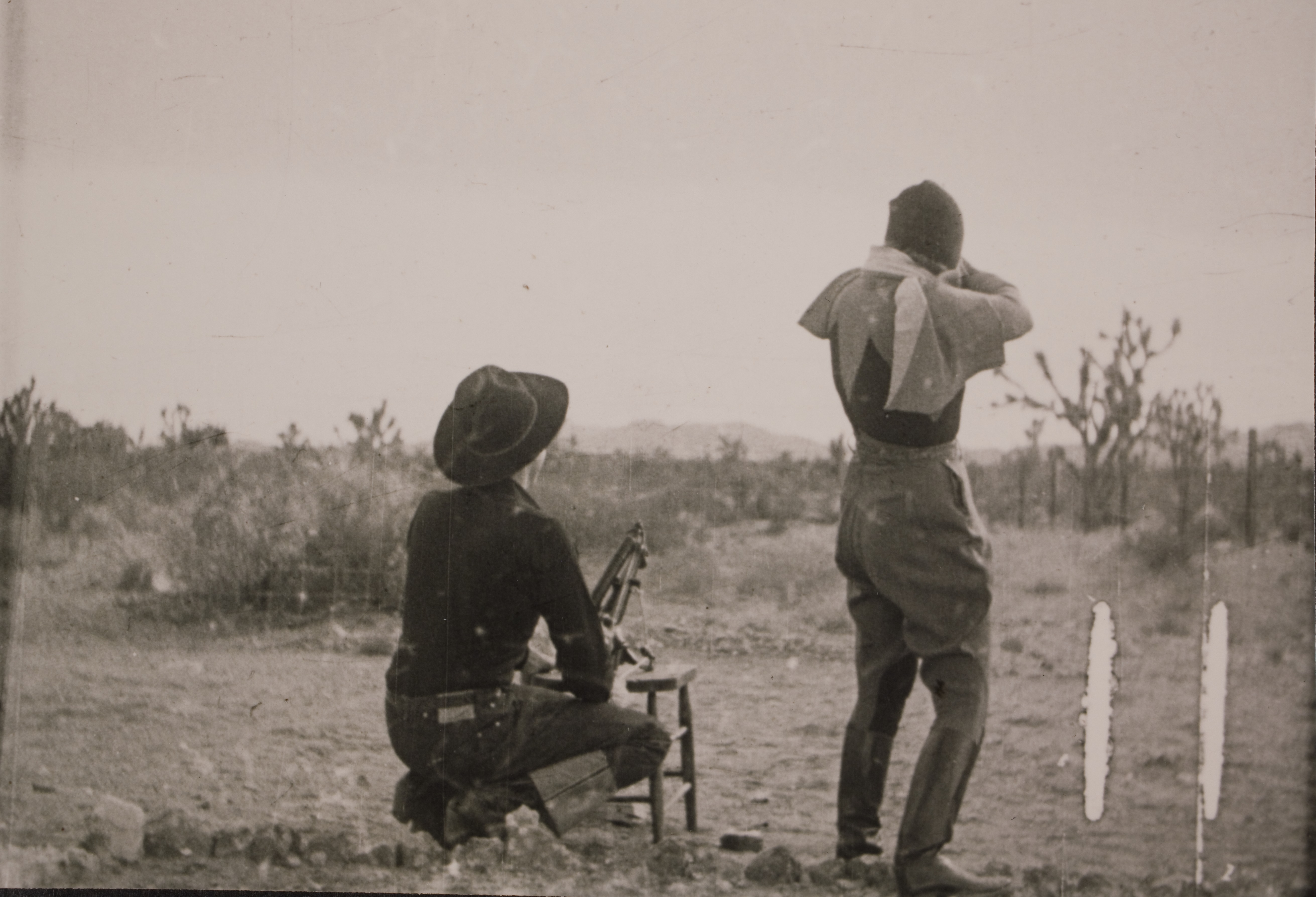 Rex Bell (George Francis Beldam) and Clara Bow at Walking Box Ranch skeet shooting.  Still image from Paramounts "Hollywood on Parade". No. B-11 / Paramount. 1934: photographic print