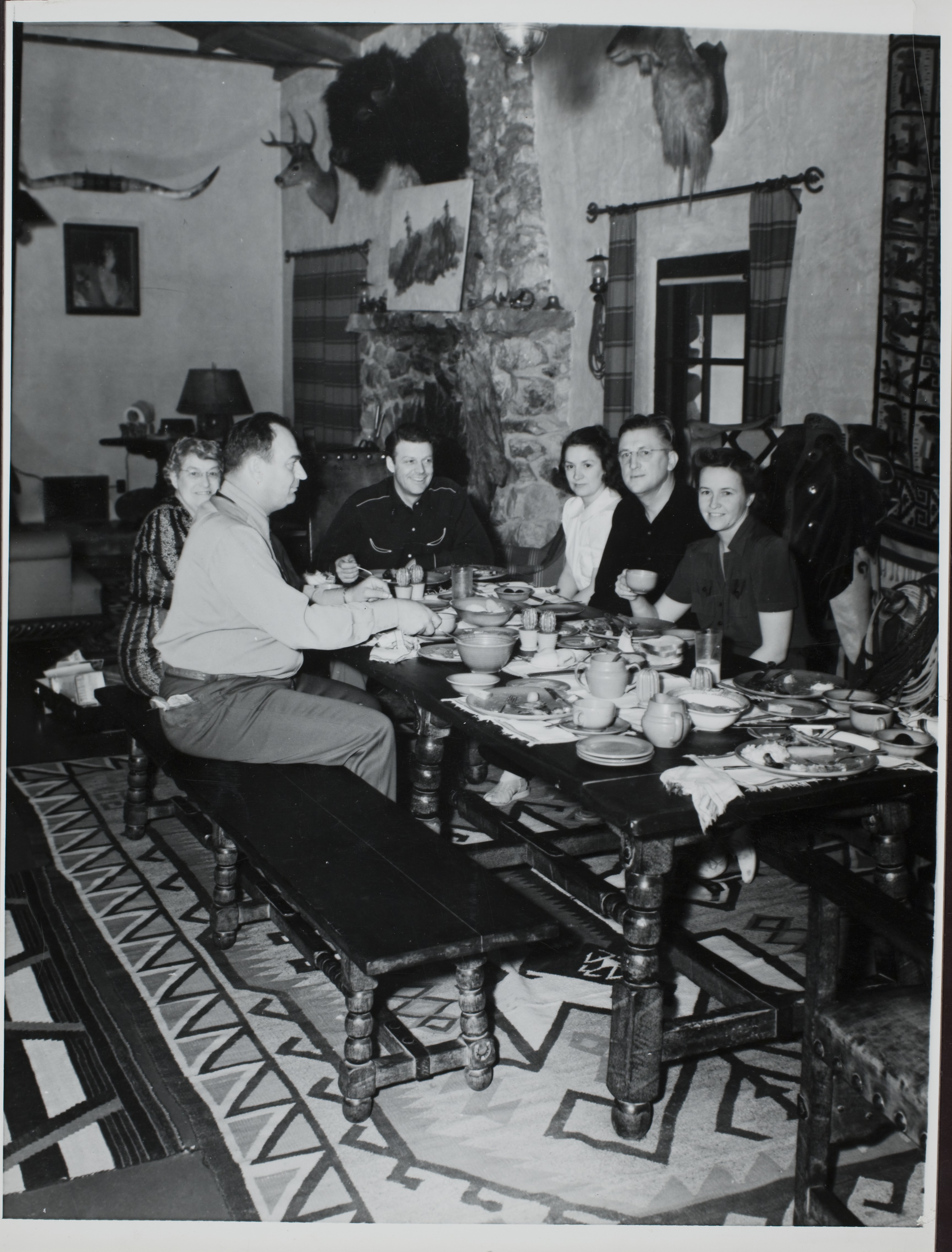 Dinner party in the great room in the ranch house at Walking Box Ranch, Nevada: photographic print