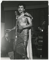 Photograph of Lena Horne performing at the Sands Hotel, Las Vegas, circa early 1960s