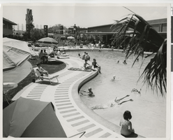 Photograph of guests enjoying the pool at the Sands Hotel, Las Vegas, circa 1963