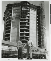Photograph of Danny Thomas and Jack Entratter in front of the Sands tower, Las Vegas, 1965