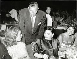 Photograph of Lauren Bacall, Jack Entratter, and Judy Garland, Las Vegas, circa early 1950s