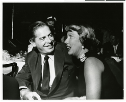Photograph of Milton Berle sitting with an unidentified woman, Sands Hotel and Casino, Las Vegas, Nevada, circa 1960s