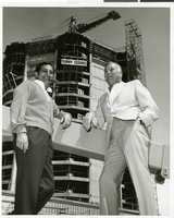 Photograph of Danny Thomas and Jack Entratter in front construction on the Sands Hotel tower, Las Vegas, 1965