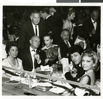 Photograph of Jack Entratter with celebrities in the Copa Room at the Sands Hotel, Las Vegas, December 1964