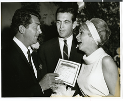 Photograph of Dean Martin with Robert Brandt and Janet Leigh at the Sands Hotel, Las Vegas, September 15, 1962
