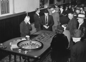 Film transparency of guests playing a game of Roulette, Las Vegas, circa 1930-1950s