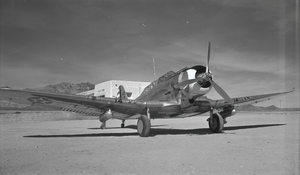 Film transparency of an Army pursuit airplane, Boulder City (Boulder Dam) Airport, circa 1930-1940