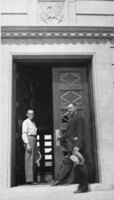 Film transparency of Walker R. Young at the entrance of the Bureau of Reclamation, Boulder City, Nevada, circa 1930-1940
