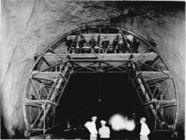 Film transparency of workers posing inside the Hoover Dam diversion tunnel, April 12, 1932