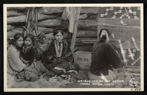 Postcard of a Navajo woman rug weaver, unidentified location, 1900-1950
