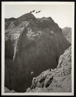 Photograph of equipment being cabled to canyon floor, Hoover Dam construction site, April 2, 1933