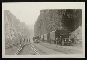 Photograph of trucks and railroad tracks at Hoover Dam construction site, circa 1930-1935