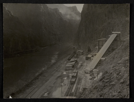Photograph of railroad siding construction on wall of Black Canyon, Hoover Dam,  circa 1930-1935