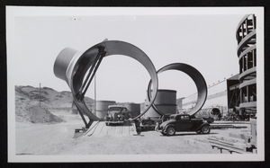 Photograph of pipe sections outside Babcock & Wilcox warehouse, Hoover Dam, circa 1930-1935