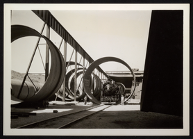 Photograph of pipes in Babcock & Wilcox warehouse, Hoover Dam, circa 1930-1935