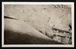 Photograph of dirt being dumped into the Colorado River for Hoover Dam cofferdam, circa 1930-1935