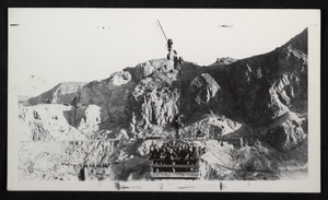 Photograph of workers being transported into Hoover Dam construction site, circa 1930-1935
