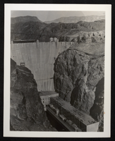 Photograph of downstream face and powerhouse of Hoover Dam, circa late 1930s