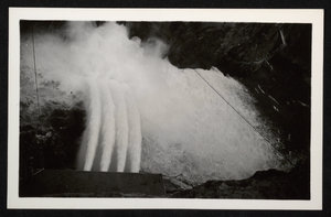 Photograph showing water discharging from jet flow gates, Hoover Dam, circa 1934-1936