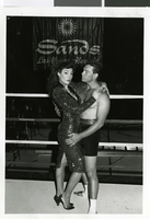 Photograph of an unidentified woman and man posing at the Sands Hotel, circa 1970s-1980s