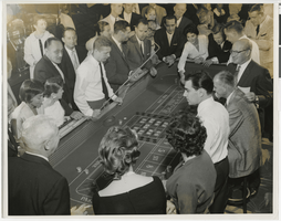Photograph of people playing craps at the Sands Hotel casino, 1959