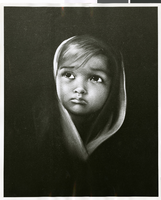 Photograph of a painting of a tearful child by Joy Caros, May 1963