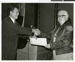 Photograph of a Sands Hotel employee receiving a certificate of merit, Las Vegas, October 3, 1968