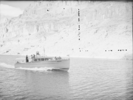 Film negative showing boat on Lake Mead, January 1938