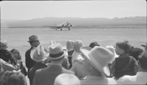 Film transparency of an airplane taking off from the Trans World Airlines airport terminal, Boulder City, circa 1930s