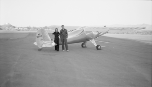 Film transparency of people near an airplane at the Trans World Airlines airport terminal, Boulder City, Nevada, circa 1930s