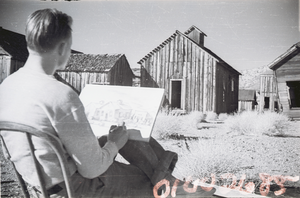 Film transparency showing a man and a house in White Hills, Arizona, circa 1930s-1940s
