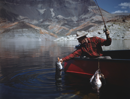 Film transparency showing a fisherman at Lake Mead, circa 1940s-1950s