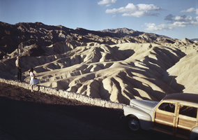Film transparency of people looking out at Death Valley, California, circa late 1940s to 1950s