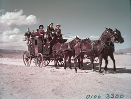 Film transparency of people on a stagecoach in Death Valley, California, circa 1942 to 1955