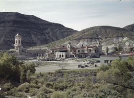 Film transparency of exterior of Scotty's Castle, Death Valley, California, circa 1940s